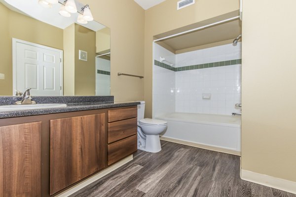 Modern bathroom with sleek fixtures at Links at Legacy Ridge Apartments offering luxurious amenities