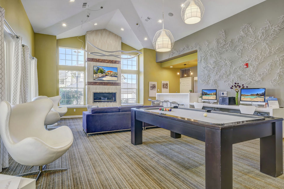 Clubhouse with modern design at Links at Legacy Ridge Apartments, highlighting luxury amenities and community spaces