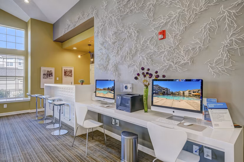 Clubhouse featuring modern design and large seating area at Links at Legacy Ridge Apartments
