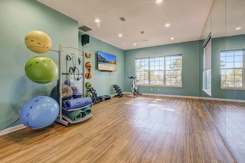 Modern fitness center with state-of-the-art equipment at Links at Legacy Ridge Apartments