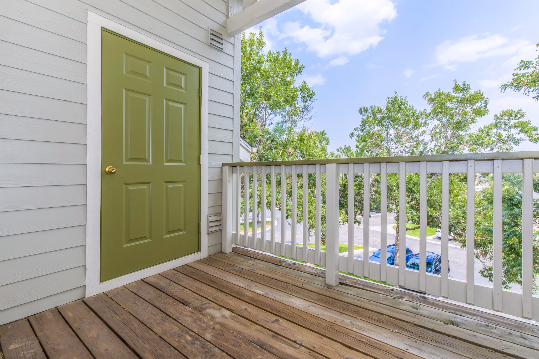 Spacious patio with modern seating at Links at Legacy Ridge Apartments offering outdoor relaxation space