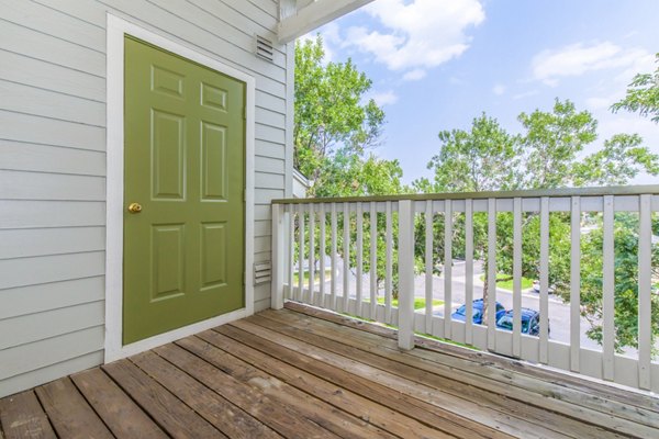 Spacious patio with modern seating at Links at Legacy Ridge Apartments offering outdoor relaxation space
