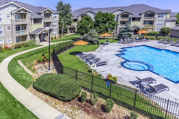 Serene outdoor pool at Links at Legacy Ridge Apartments, offering a luxurious retreat with tranquil views