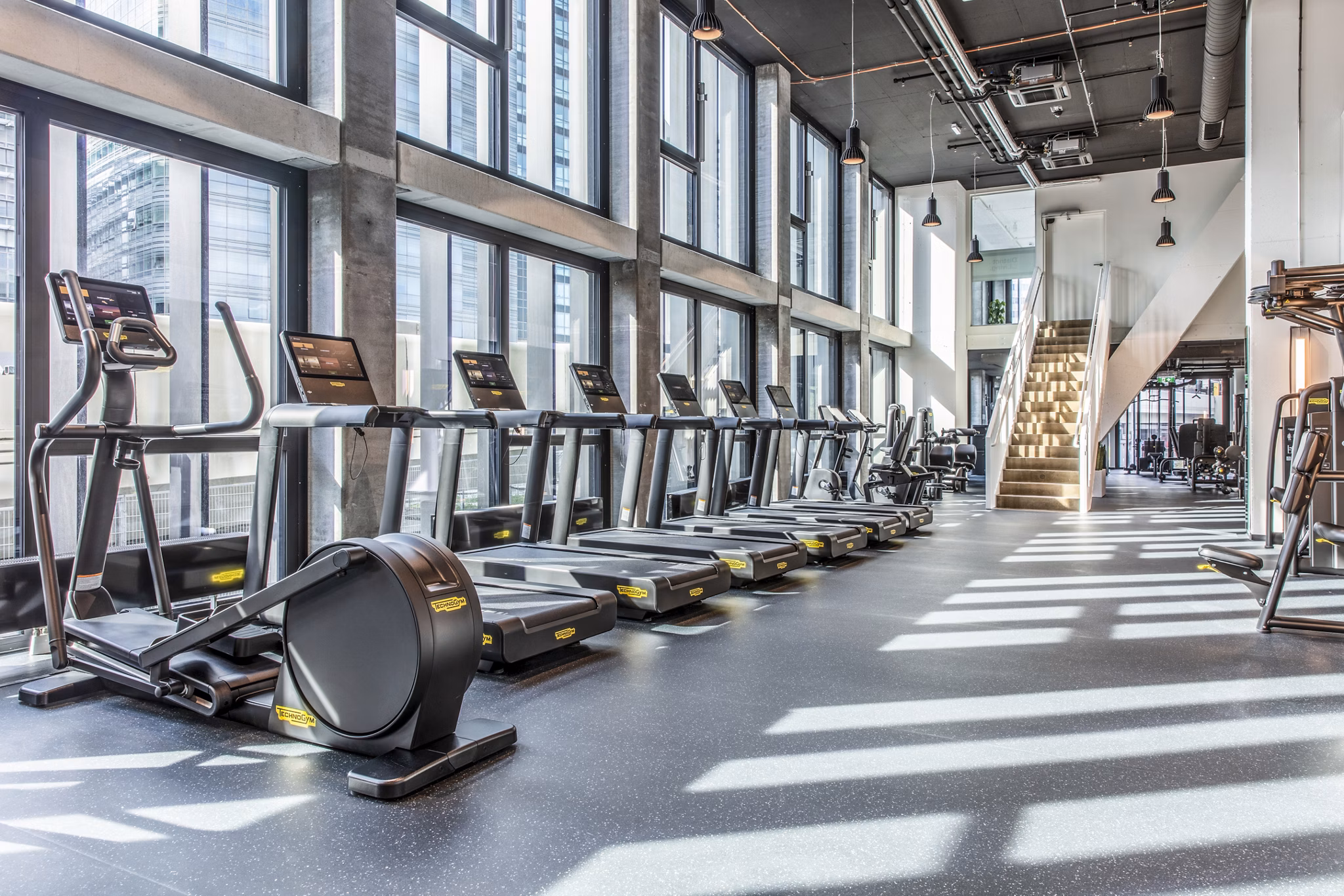fitness center at District Living Apartments