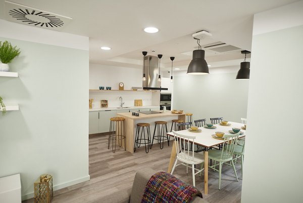 Bright and welcoming dining area at Canvas Bristol with a contemporary design and communal seating.
