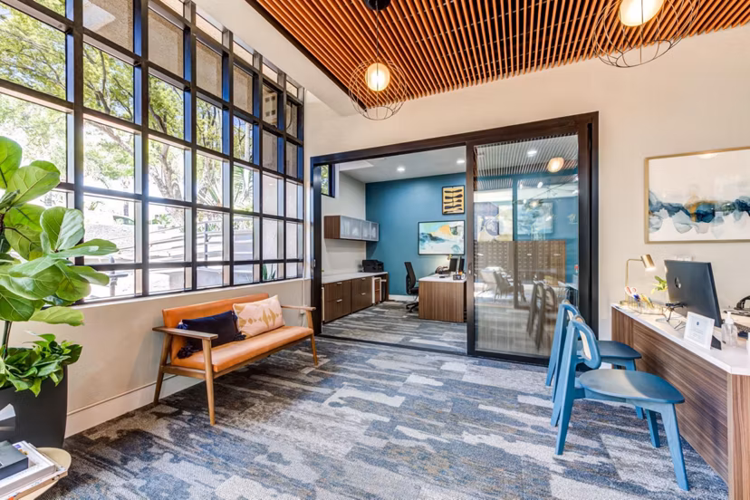 Vue Los Feliz Apartments: Stylish clubhouse with elegant seating and modern decor ideal for relaxing or socializing