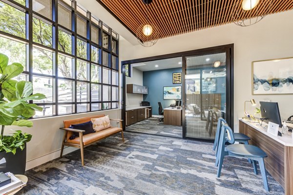 Clubhouse featuring modern seating and entertainment space at Vue Los Feliz Apartments