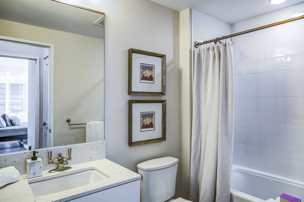 Brookland Press Apartments: Modern bathroom with sleek design and high-end fixtures