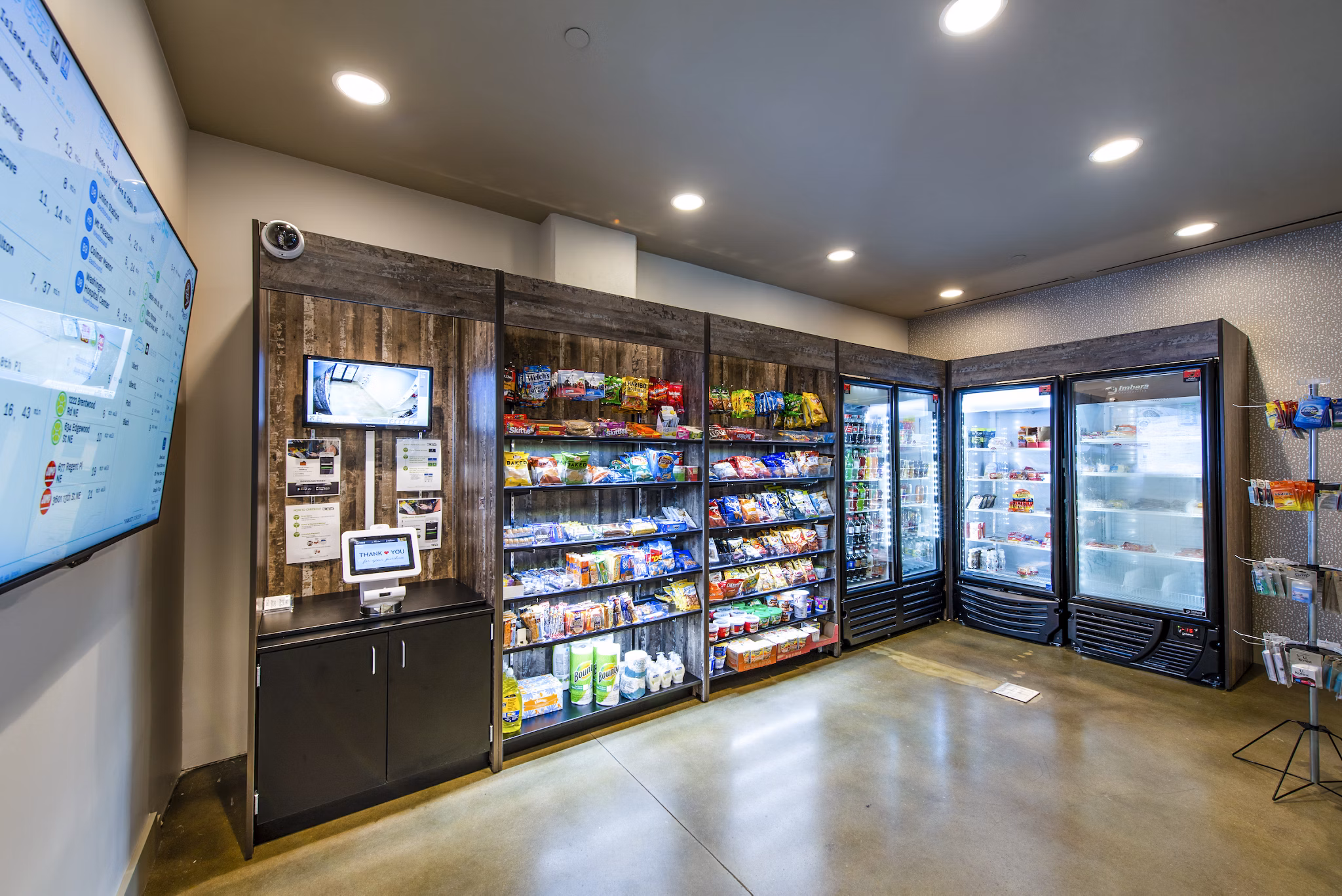 Modern clubhouse with inviting lobby space at Brookland Press Apartments in Washington DC, perfect for social gatherings and work-from-home setups