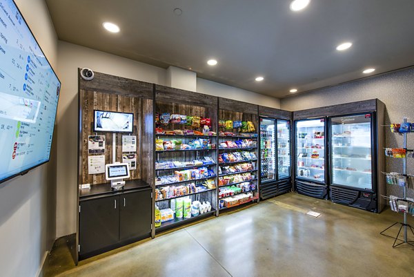 Modern clubhouse with inviting lobby space at Brookland Press Apartments in Washington DC, perfect for social gatherings and work-from-home setups