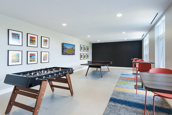Brookland Press Apartments: Modern clubhouse lobby with stylish seating and contemporary decor