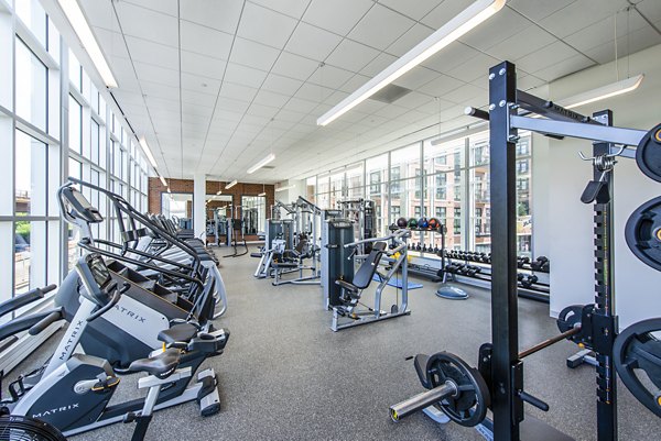 State-of-the-art fitness center with modern equipment at Brookland Press Apartments