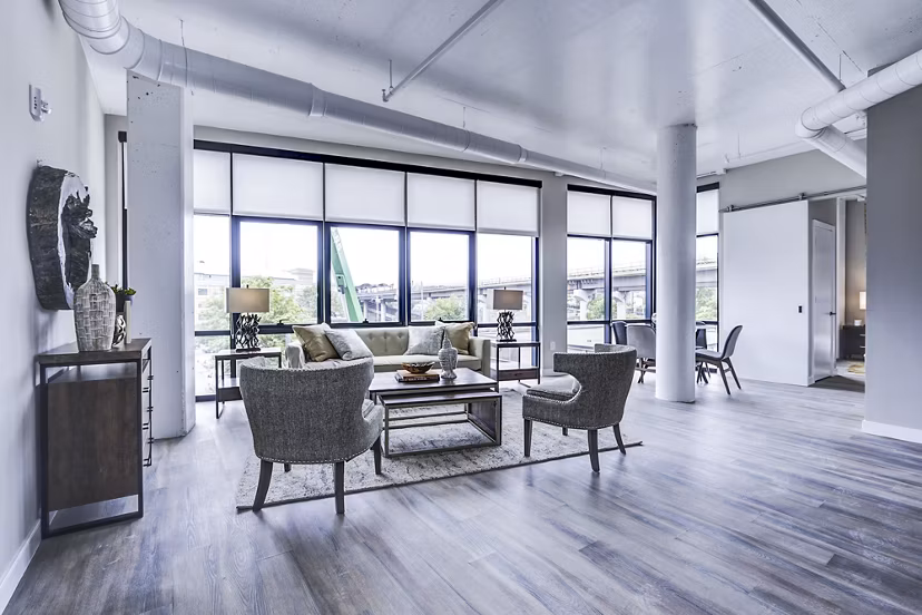 Modern living room with stylish furnishings at Brookland Press Apartments