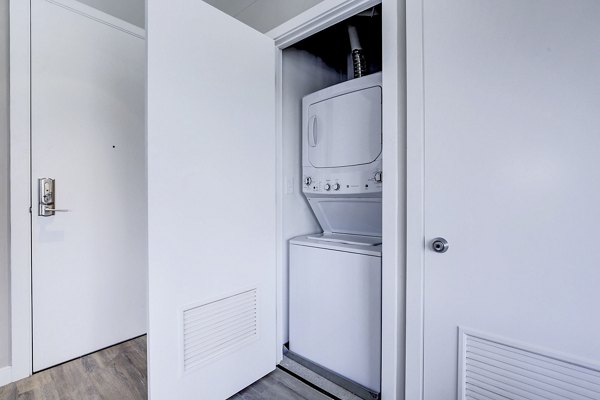 laundry room at Brookland Press Apartments