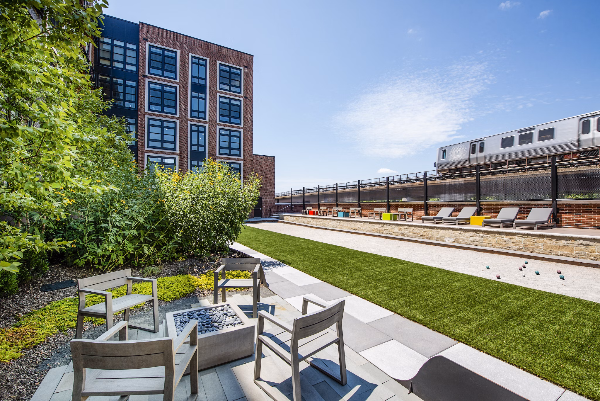 Bocce sport court at Brookland Press Apartments featuring modern design for active residents