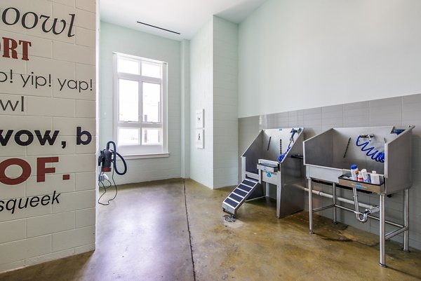 Convenient dog wash station at Brookland Press Apartments, a Greystar luxury property designed for pet-friendly living in the city