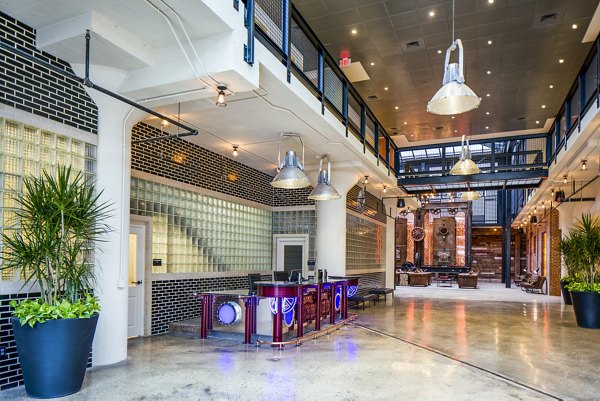 Hecht Warehouse Apartments: Stylish clubhouse lobby with contemporary design elements and cozy seating areas