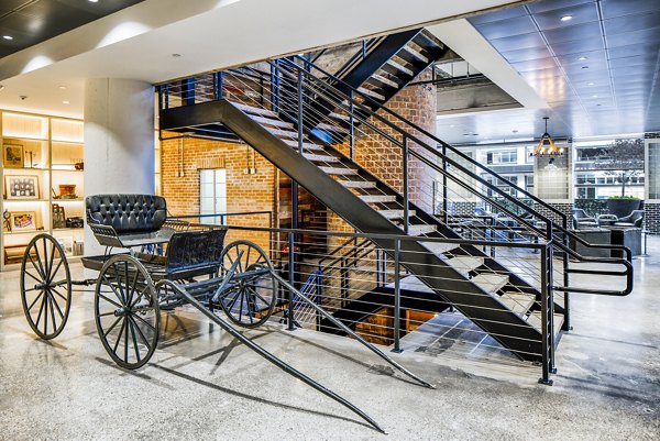 Modern clubhouse interior with stylish seating at Hecht Warehouse Apartments