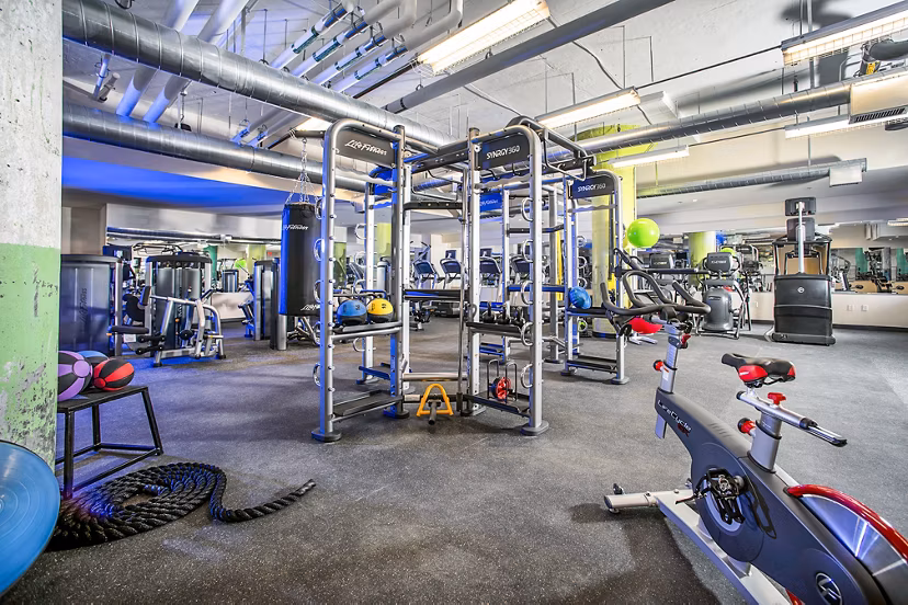 State-of-the-art fitness center with modern equipment at Hecht Warehouse Apartments
