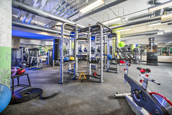 State-of-the-art fitness center with modern equipment at Hecht Warehouse Apartments