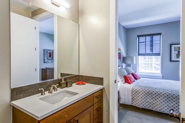 Spacious bathroom with modern fixtures at Willow & Maple Apartments