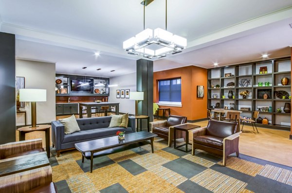 Clubhouse lobby featuring modern furnishings and open design at Willow & Maple Apartments