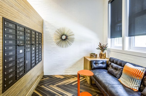 Mail room with secure package lockers at Willow & Maple Apartments