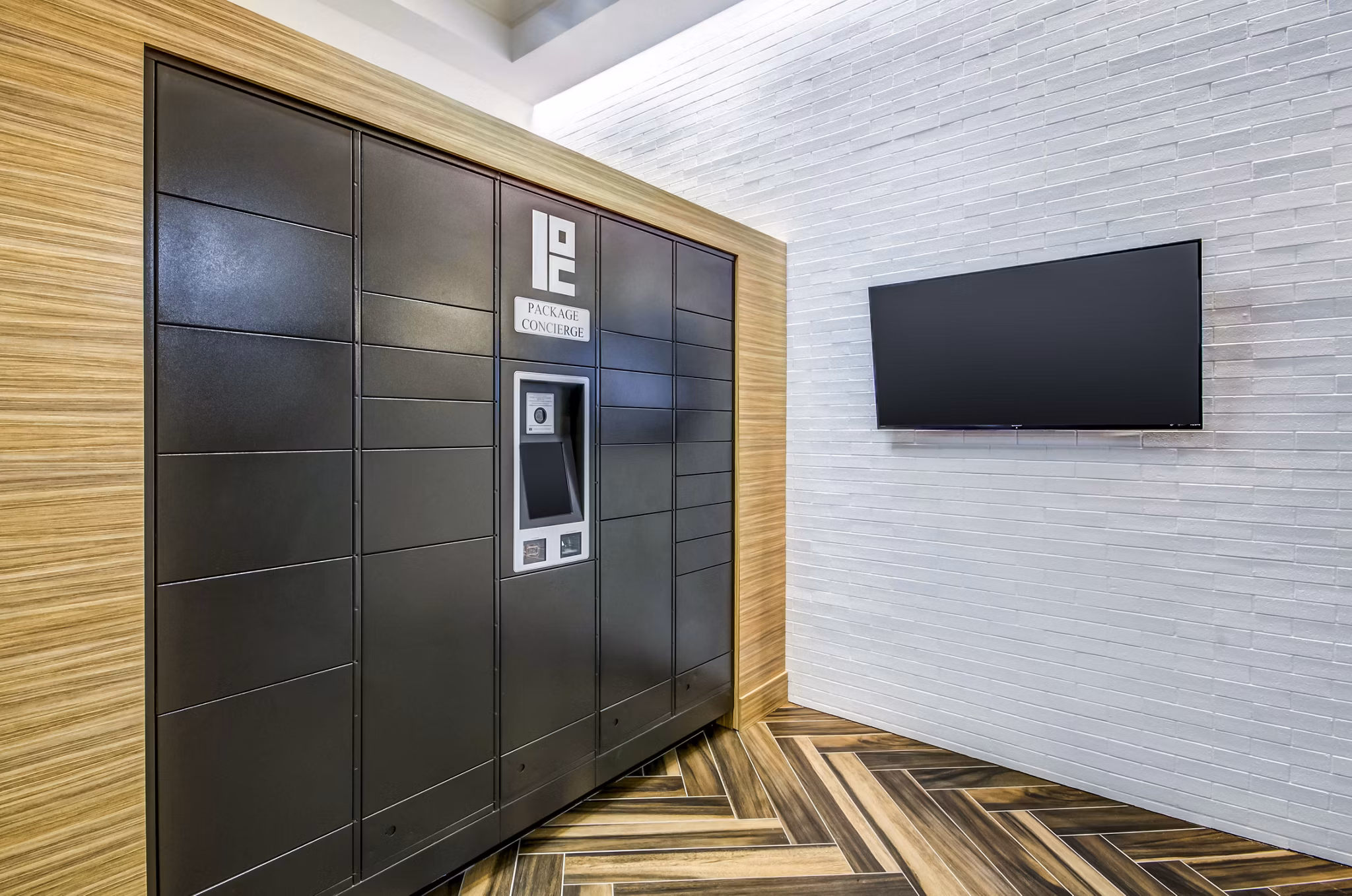 Parcel pickup locker at Willow & Maple Apartments, convenient amenity for residents seeking secure package storage and easy access
