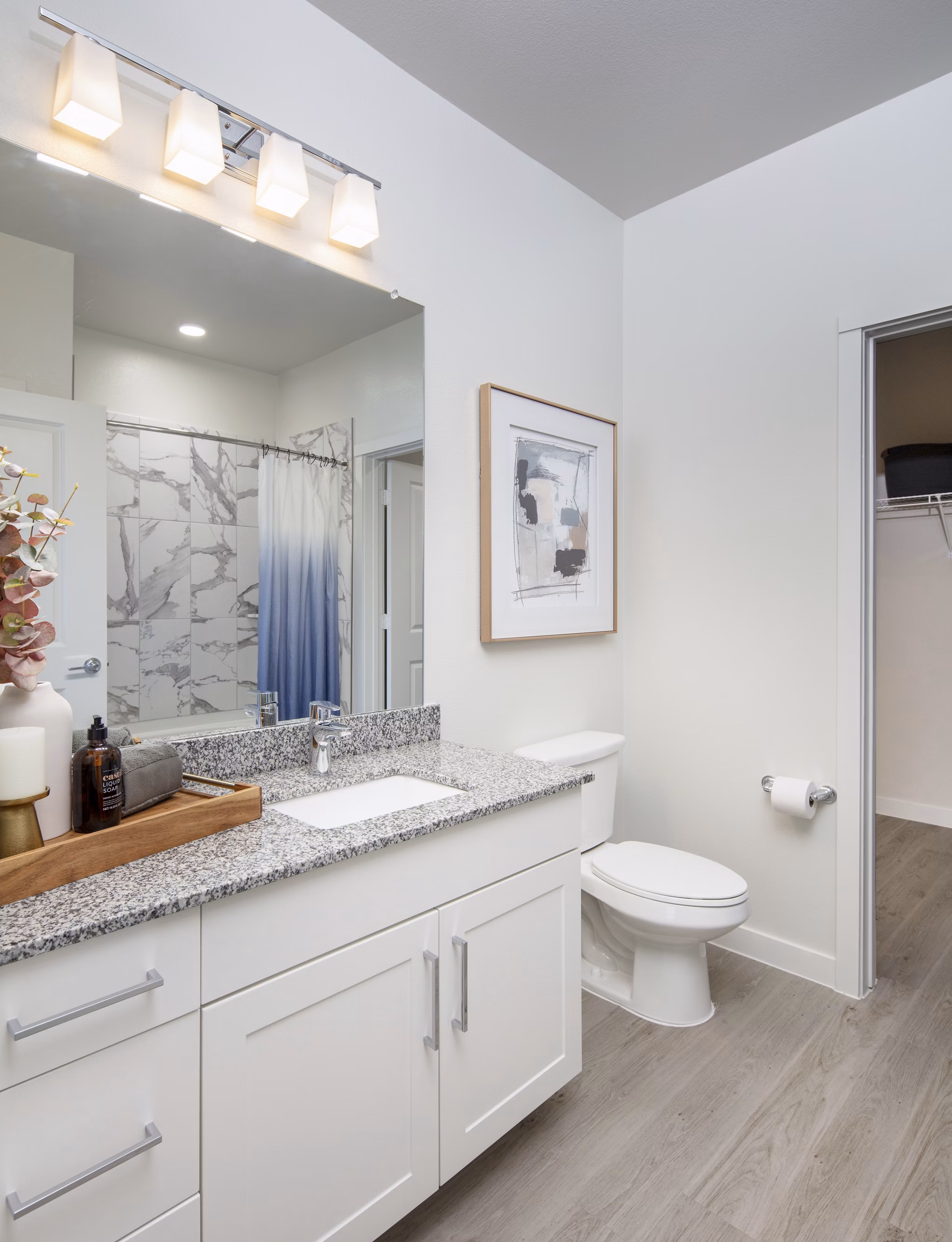 Bathroom with modern fixtures and ample storage at Prose Westover Hills Apartments