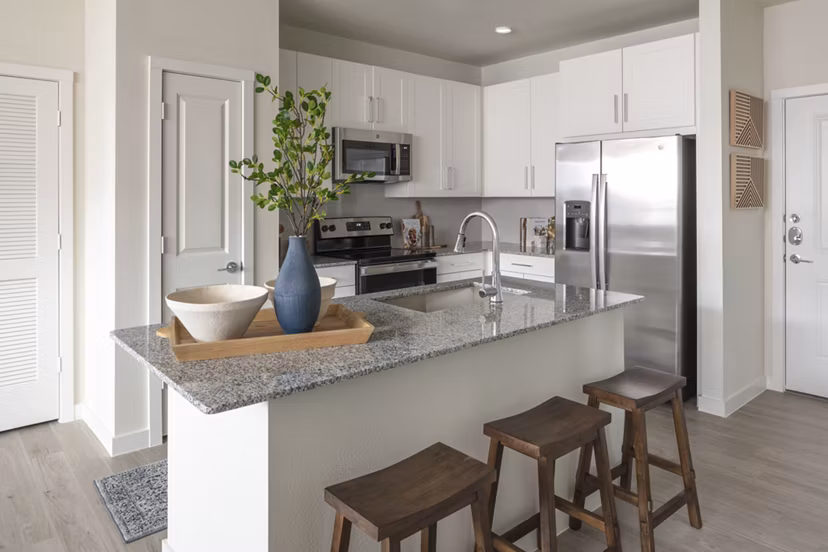 Modern kitchen with stainless steel appliances at Prose Westover Hills Apartments