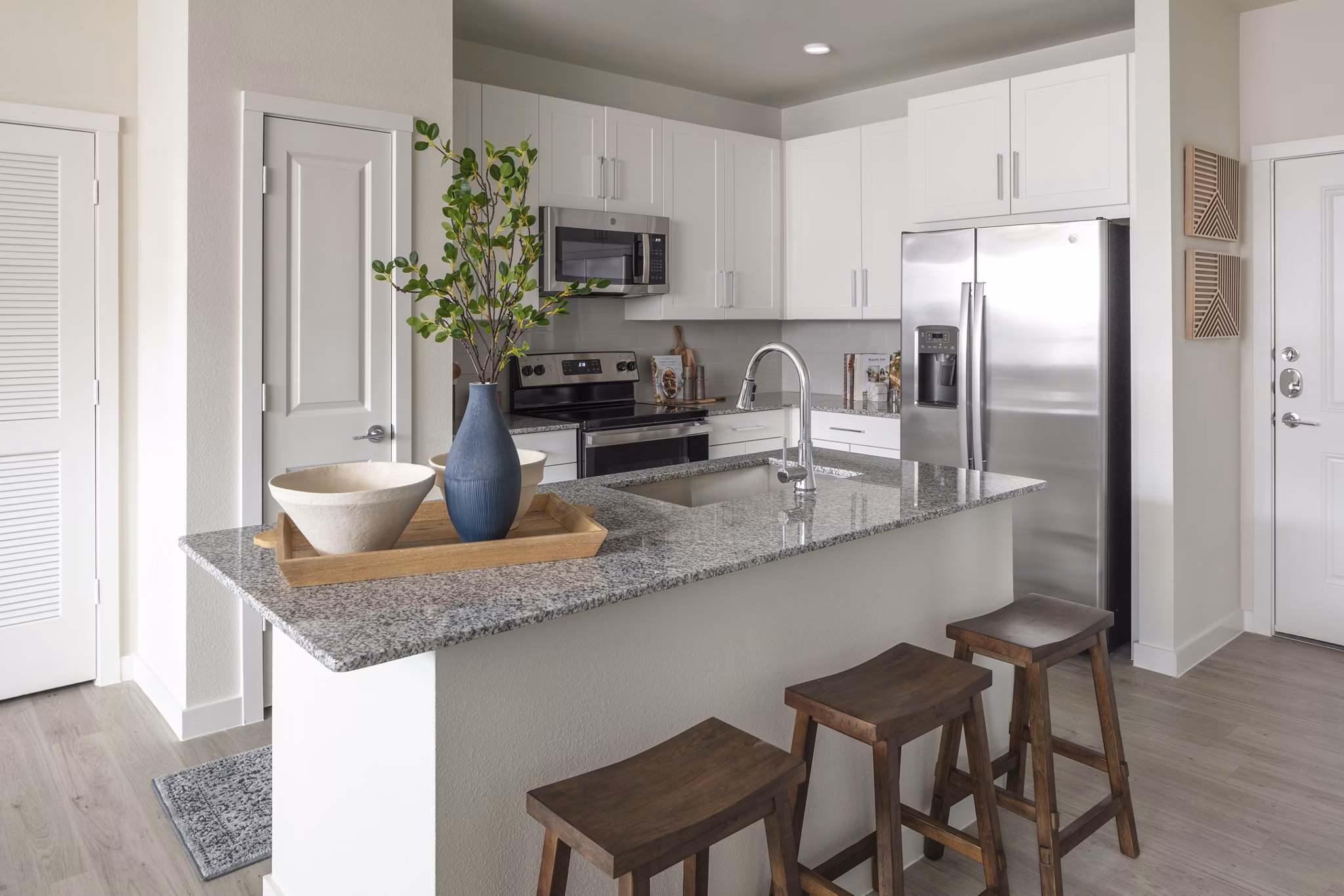 Modern kitchen with stainless steel appliances at Prose Westover Hills Apartments