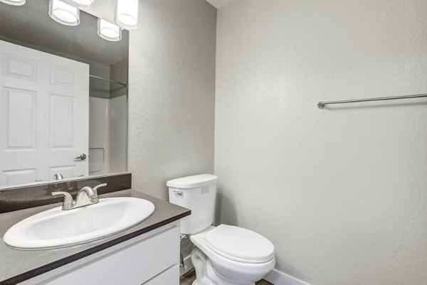 Modern bathroom featuring sleek fixtures and tile accents at Avana Vista Point Apartments
