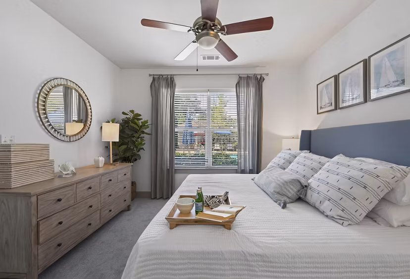 Spacious bedroom with elegant decor at The Landing at Vinnin Square Apartments