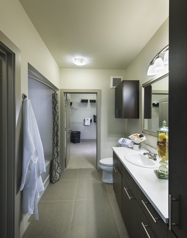 Modern bathroom with sleek fixtures at The Landing at Vinnin Square Apartments