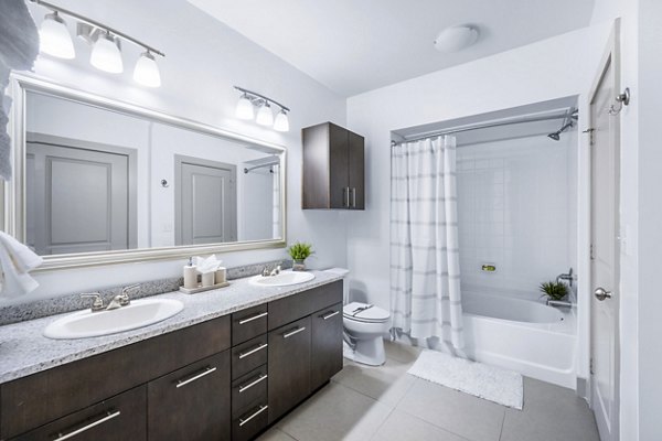 Modern bathroom with sleek fixtures at The Landing at Vinnin Square Apartments