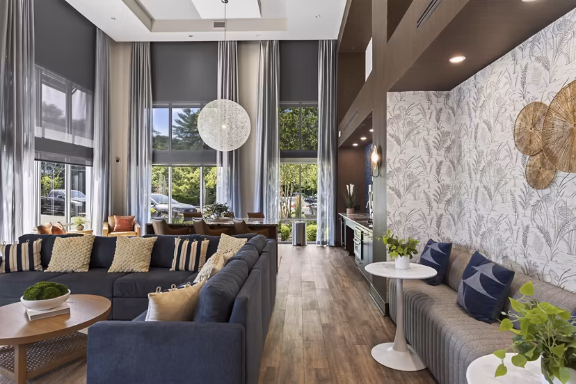 Clubhouse with modern seating and open space design at The Landing at Vinnin Square Apartments