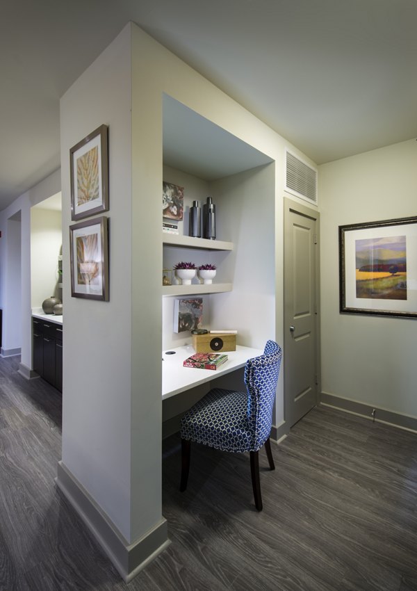 Cozy bedroom with contemporary decor at The Landing at Vinnin Square Apartments