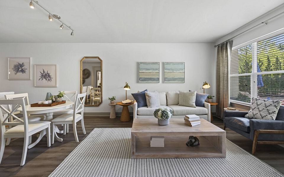Spacious living room with modern decor in The Landing at Vinnin Square Apartments