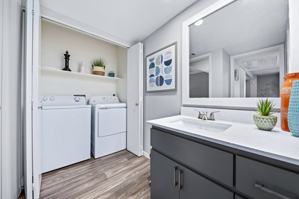 bathroom and laundry at Pointe at South Mountain Apartments