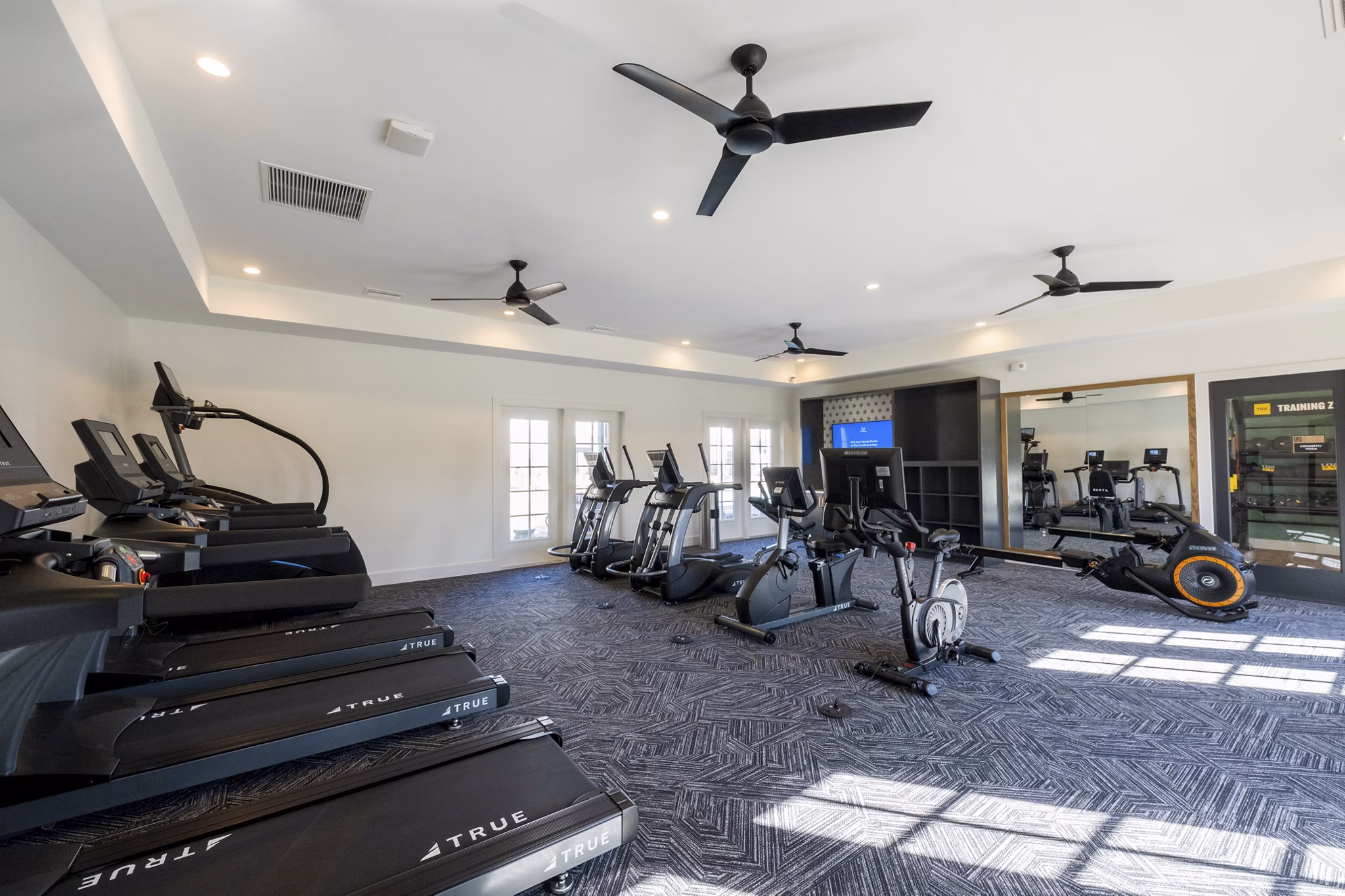 State-of-the-art fitness center with modern equipment at Ryder Junction Apartments