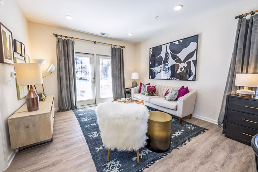 Bright living room with elegant decor at Ryder Junction Apartments, offering luxury and comfort in premium accommodations