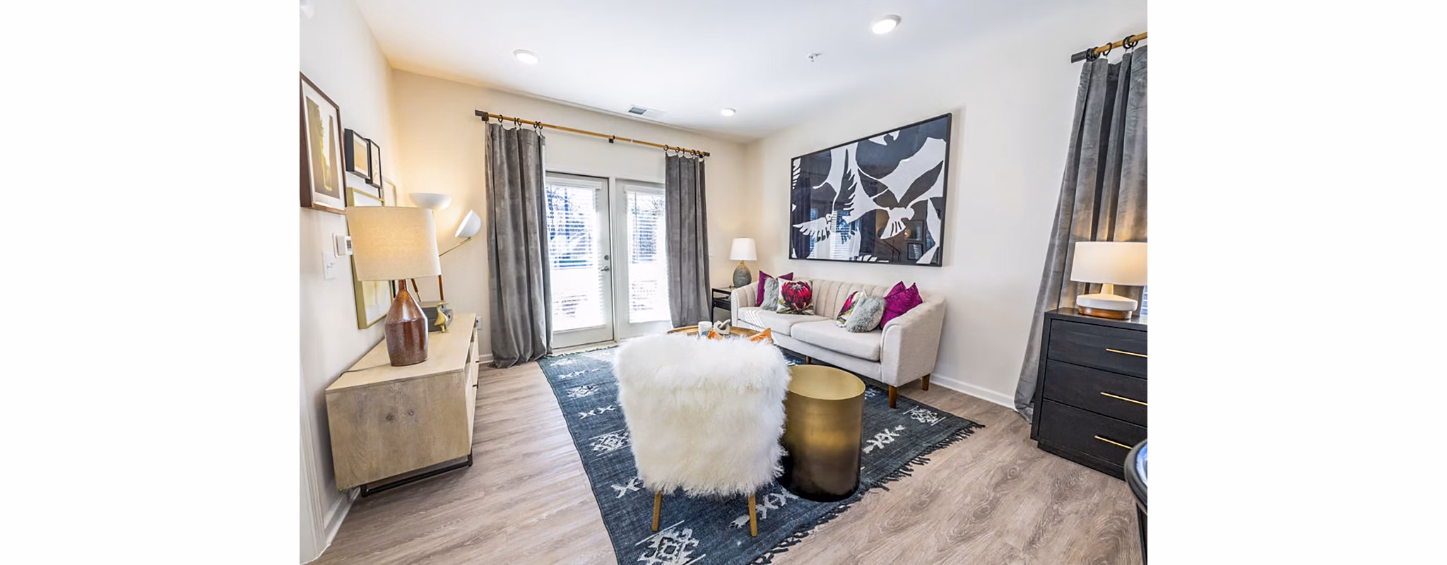 Bright living room with elegant decor at Ryder Junction Apartments, offering luxury and comfort in premium accommodations