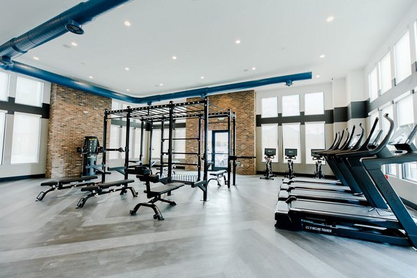 fitness center at Embold Apartments 
