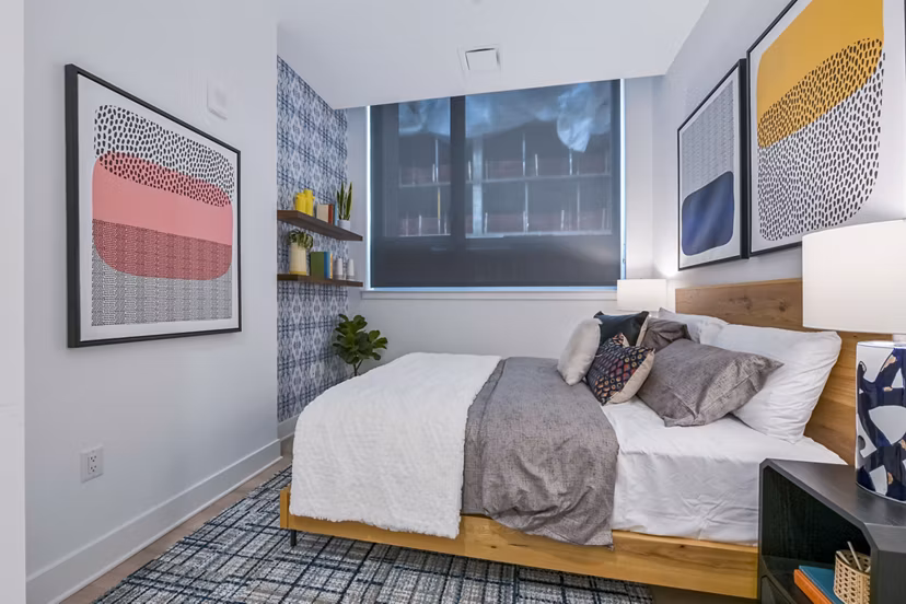 Modern bedroom with elegant decor at SoNYa Apartments, Greystar luxury apartments
