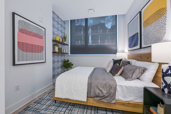 Modern bedroom with elegant decor at SoNYa Apartments, Greystar luxury apartments