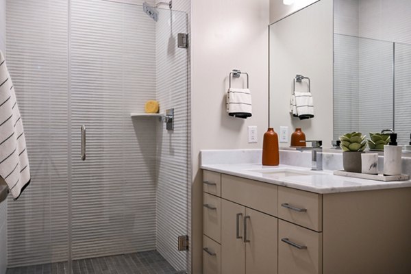 Modern bathroom with sleek fixtures at SoNYa Apartments in NYC, luxury living