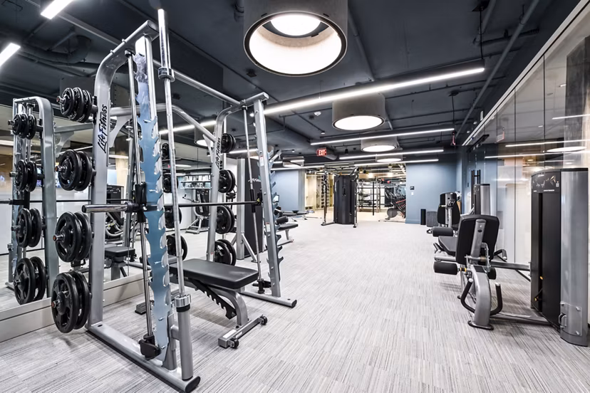 State-of-the-art fitness center with modern equipment at SoNYa Apartments