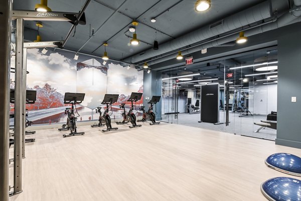 Yoga and spin studio with modern equipment at SoNYa Apartments
