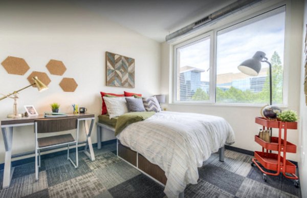 Modern bedroom with elegant decor at The Edge Apartments, showcasing luxury living and comfort for residents