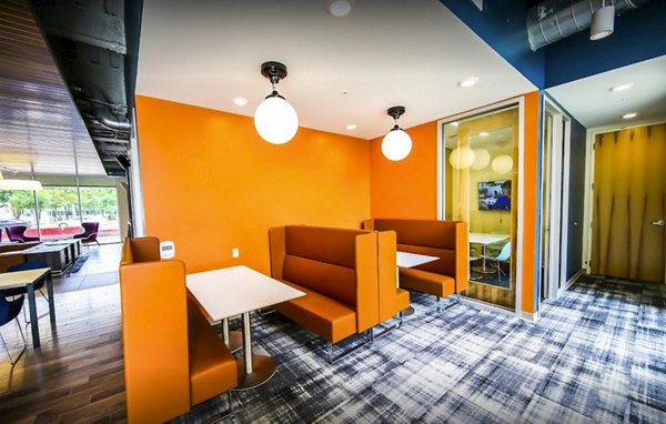 Clubhouse with spacious seating and modern design at The Edge Apartments oferecendo luxury living experiences